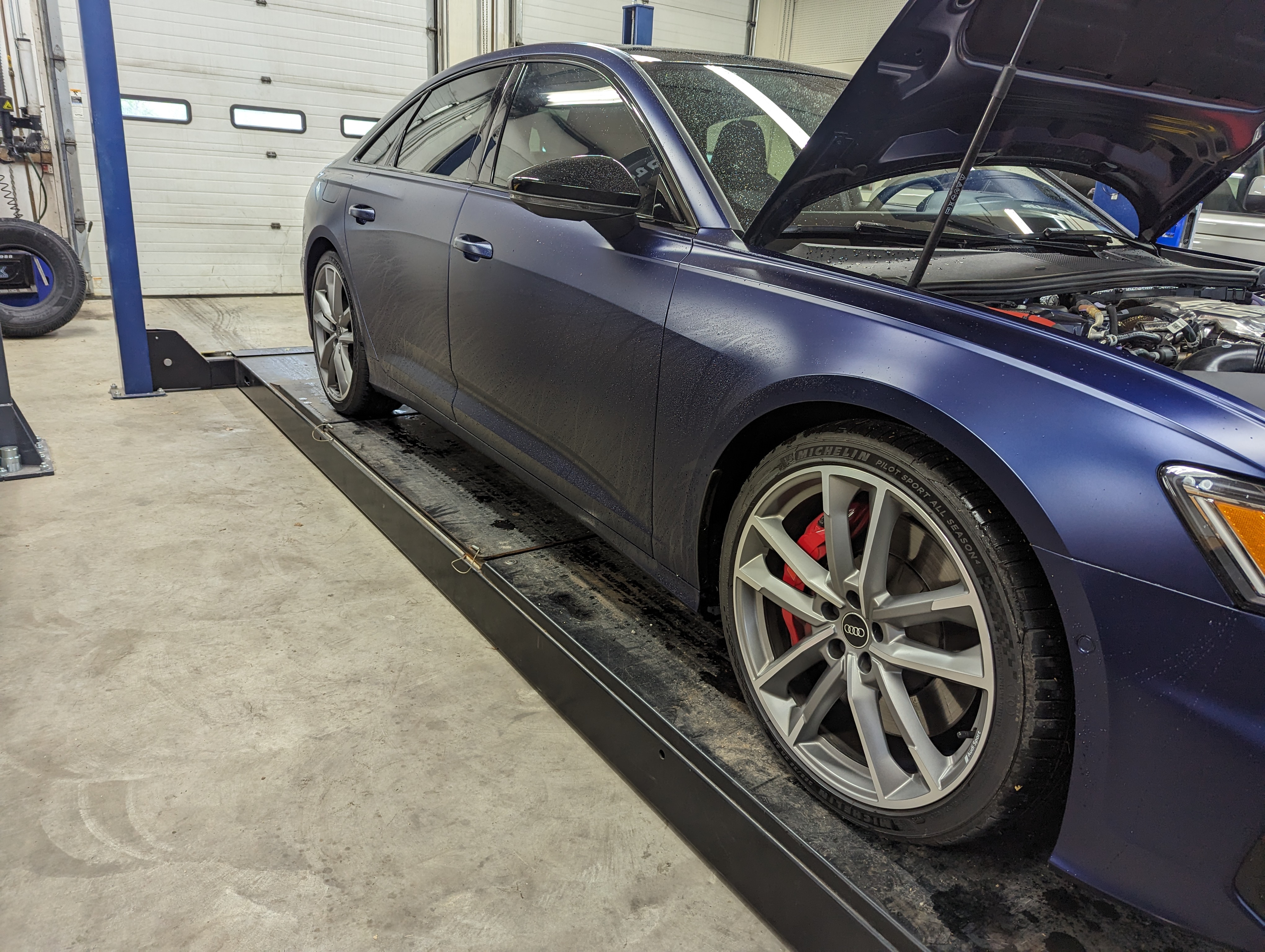 Audi S6 on alignment rack at Lux AutoHause