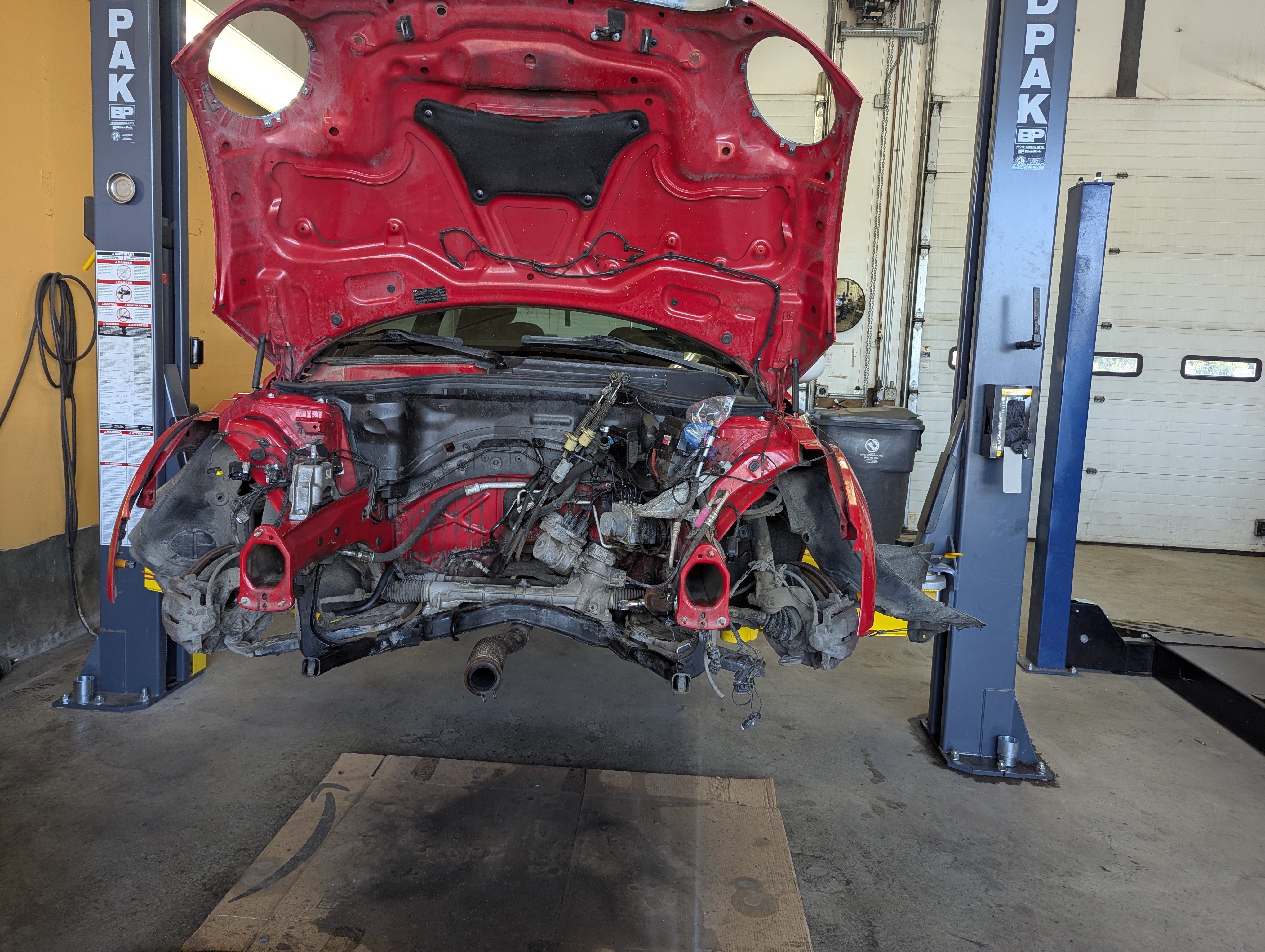 2007 MINI Cooper S with engine removed at Lux AutoHause